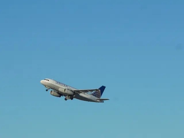 In this picture there is a view of the airport. In the front there is a white color tower and some...